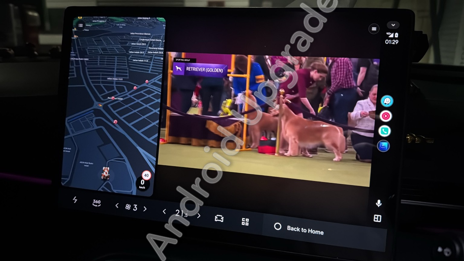 Customer car display showing a navigation map beside a video